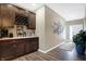 A hallway featuring wood floors, decor and a coffee and wine bar at 1684 Beach St, Greenwood, IN 46143