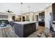 Beautiful kitchen features a center island with counter seating and modern stainless appliances at 1684 Beach St, Greenwood, IN 46143