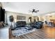 Inviting living room with modern furniture, decorative rug, and natural light shining through at 1684 Beach St, Greenwood, IN 46143