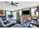 Bright living room offering cozy seating, a large window view and great natural light at 1684 Beach St, Greenwood, IN 46143