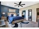 Spacious main bedroom with a large bed, ensuite bathroom, and stylish decor at 1684 Beach St, Greenwood, IN 46143
