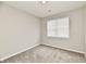 Neutral bedroom featuring carpeted floors and a single window at 1803 Jackson St, Fortville, IN 46040