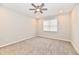 Spacious bedroom featuring neutral walls, carpet, ceiling fan, recessed lighting, and a window at 1803 Jackson St, Fortville, IN 46040