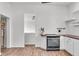 This view showcases the kitchen's modern appliances, countertops, and open layout at 1854 Applegate St, Indianapolis, IN 46203