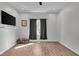 This living room features hardwood floors, modern lighting, and ample space at 1854 Applegate St, Indianapolis, IN 46203