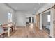 Bright living room with wood floors, and sliding wood door at 1854 Applegate St, Indianapolis, IN 46203