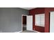Bedroom with large closet and neutral walls, creating a serene and inviting space at 2028 George St, Anderson, IN 46016