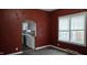 Living room showcasing arched entryways to the kitchen and natural light at 2028 George St, Anderson, IN 46016