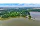 Beautiful aerial view of lakefront property with multiple boat docks for easy water access at 22 Point Ln, Arcadia, IN 46030