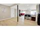 Wide open basement featuring light wood floors, support columns, and a view of the pool table area at 22 Point Ln, Arcadia, IN 46030