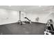Basement gym with rubber flooring, white walls, and minimal equipment at 22 Point Ln, Arcadia, IN 46030