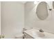 Bathroom featuring a vanity with granite countertop and an oval mirror at 22 Point Ln, Arcadia, IN 46030