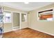 Dining room with hardwood floors and windows to the kitchen at 22 Point Ln, Arcadia, IN 46030
