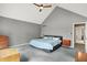 Bright main bedroom with ceiling fan and neutral decor at 22 Point Ln, Arcadia, IN 46030