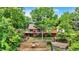 Charming lakefront home boasting a large wooden deck and direct access to the water at 22 Point Ln, Arcadia, IN 46030