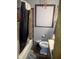 Bathroom features a shower-tub combo and tiled wall at 2522 S Randolph St, Indianapolis, IN 46203