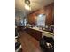 Kitchen with brown cabinets, undermount sink and wood floors at 2522 S Randolph St, Indianapolis, IN 46203