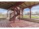 Covered porch with steps and wooden planks at 2702 N Talbott St, Indianapolis, IN 46205