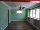 Dining room features a built in display case and hardwood floors at 3035 Graceland Ave, Indianapolis, IN 46208