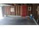 Large garage with interior storage and door to back yard at 3035 Graceland Ave, Indianapolis, IN 46208