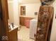Bathroom featuring linoleum tile and washer and dryer at 3036 Chase St, Indianapolis, IN 46217