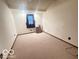 Bedroom with natural light and neutral carpet at 3036 Chase St, Indianapolis, IN 46217
