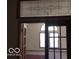 Bright foyer with a decorative transom window above doorway at 3036 Chase St, Indianapolis, IN 46217