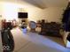 Spacious living room with TV and a variety of furniture at 3036 Chase St, Indianapolis, IN 46217