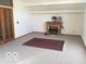 Bright living room with fireplace and decorative rug at 3036 Chase St, Indianapolis, IN 46217