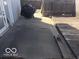 Patio area with concrete pad and wooden deck at 3036 Chase St, Indianapolis, IN 46217