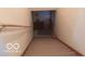 Carpeted staircase leading to the lower level at 3036 Chase St, Indianapolis, IN 46217