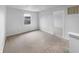 Bright bedroom with a cozy carpet, a window offering great views, and ample space at 3313 Capsella Ln, Indianapolis, IN 46203