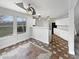 Cozy kitchen featuring granite countertops, white cabinetry, and an island bar at 3313 Capsella Ln, Indianapolis, IN 46203