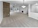 Expansive living room with an open floor plan and large windows, seamlessly blending modern design with comfort at 3313 Capsella Ln, Indianapolis, IN 46203