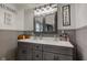 Stylish bathroom featuring double sinks, modern fixtures, and decorative accents at 502 E Washington St, Summitville, IN 46070