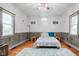 Cozy bedroom showcasing hardwood floors and decor for a relaxing retreat at 502 E Washington St, Summitville, IN 46070