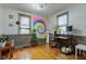 Bright home office with natural light and decorative tapestry at 502 E Washington St, Summitville, IN 46070