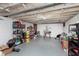 Unfinished basement with concrete floors, shelving, and exposed ceiling at 518 N Emerson Ave, Indianapolis, IN 46219