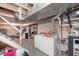 Unfinished basement space featuring a washer and dryer along with exposed ductwork at 518 N Emerson Ave, Indianapolis, IN 46219