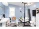Serene bathroom featuring a clawfoot tub and bright lighting at 518 N Emerson Ave, Indianapolis, IN 46219