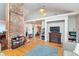 Inviting living space with hardwood floors, fireplace, and comfortable seating perfect for relaxing and entertaining guests at 518 N Emerson Ave, Indianapolis, IN 46219