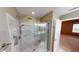 Modern bathroom with a glass-enclosed shower featuring stylish tiling and contemporary fixtures at 5180 Dunewood Way # 57, Avon, IN 46123