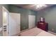 Cozy bedroom featuring a comfortable bed, dresser, closet, and neutral tones at 5180 Dunewood Way # 57, Avon, IN 46123