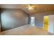 Bright and spacious bedroom with a ceiling fan, providing a comfortable and airy retreat for relaxation at 5180 Dunewood Way # 57, Avon, IN 46123