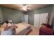 Serene bedroom with soft lighting, closet and dresser offering a peaceful retreat within the home at 5180 Dunewood Way # 57, Avon, IN 46123