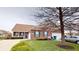 Charming brick home with a well-manicured lawn and landscaping, enhancing its curb appeal and inviting presence at 5180 Dunewood Way # 57, Avon, IN 46123