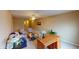 Spacious living room with ceiling fan, plush seating, and desk area at 5180 Dunewood Way # 57, Avon, IN 46123