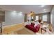 Spacious living room with hardwood floors, comfortable furniture, and abundant natural light at 5180 Dunewood Way # 57, Avon, IN 46123