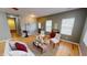 Inviting living room featuring hardwood floors and stylish decor, creating a warm and welcoming atmosphere at 5180 Dunewood Way # 57, Avon, IN 46123