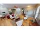 Comfortable living room with stylish furniture, hardwood floors, and a fireplace, perfect for relaxation at 5180 Dunewood Way # 57, Avon, IN 46123